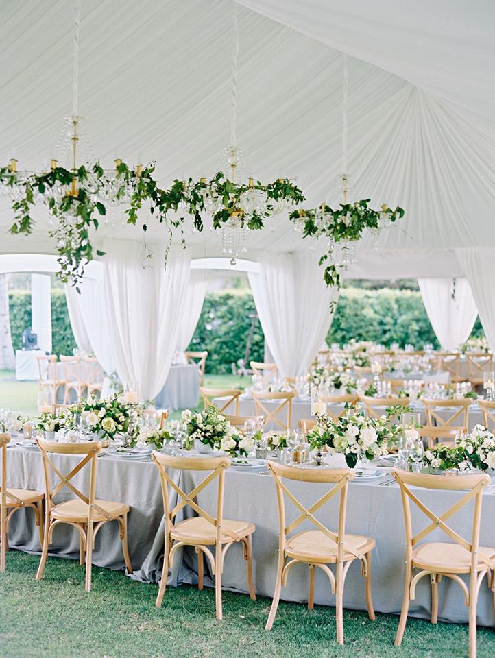 Middle Lawn reception under draped marquee with chandeliers