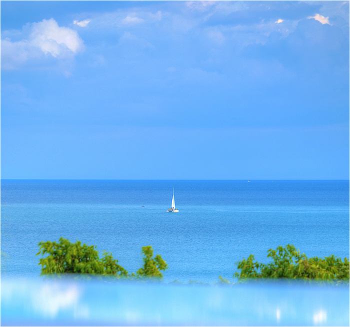 sailboat on the horizon